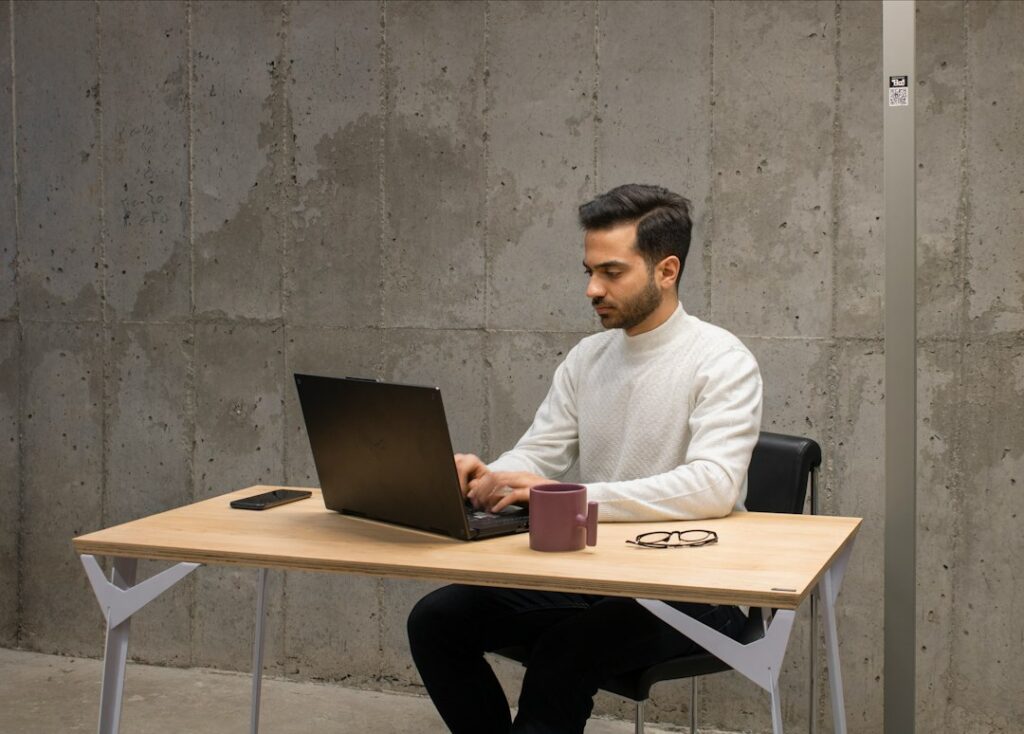 Working on a website project at a laptop