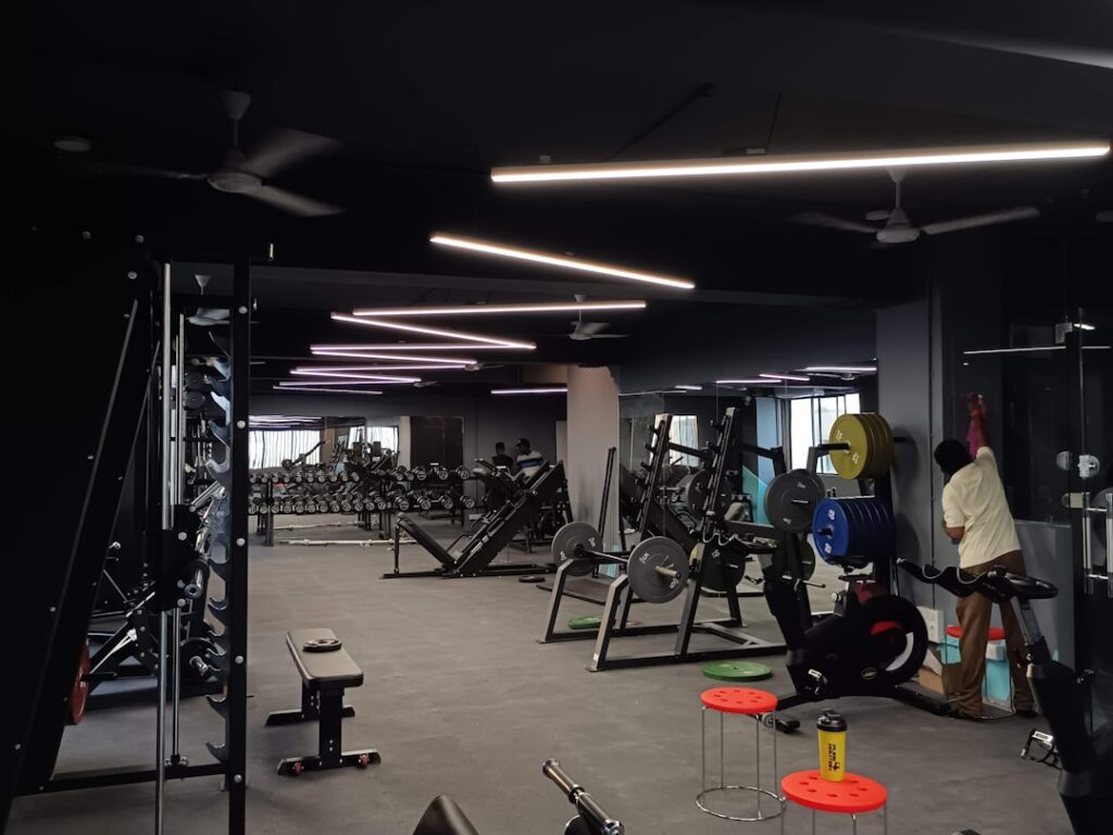 Fitness studio gym interior with equipment